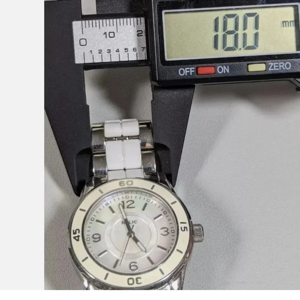 Relic Pearlized Dial White Bezel Round Silver Tone Case Link Bracelet Band Watch